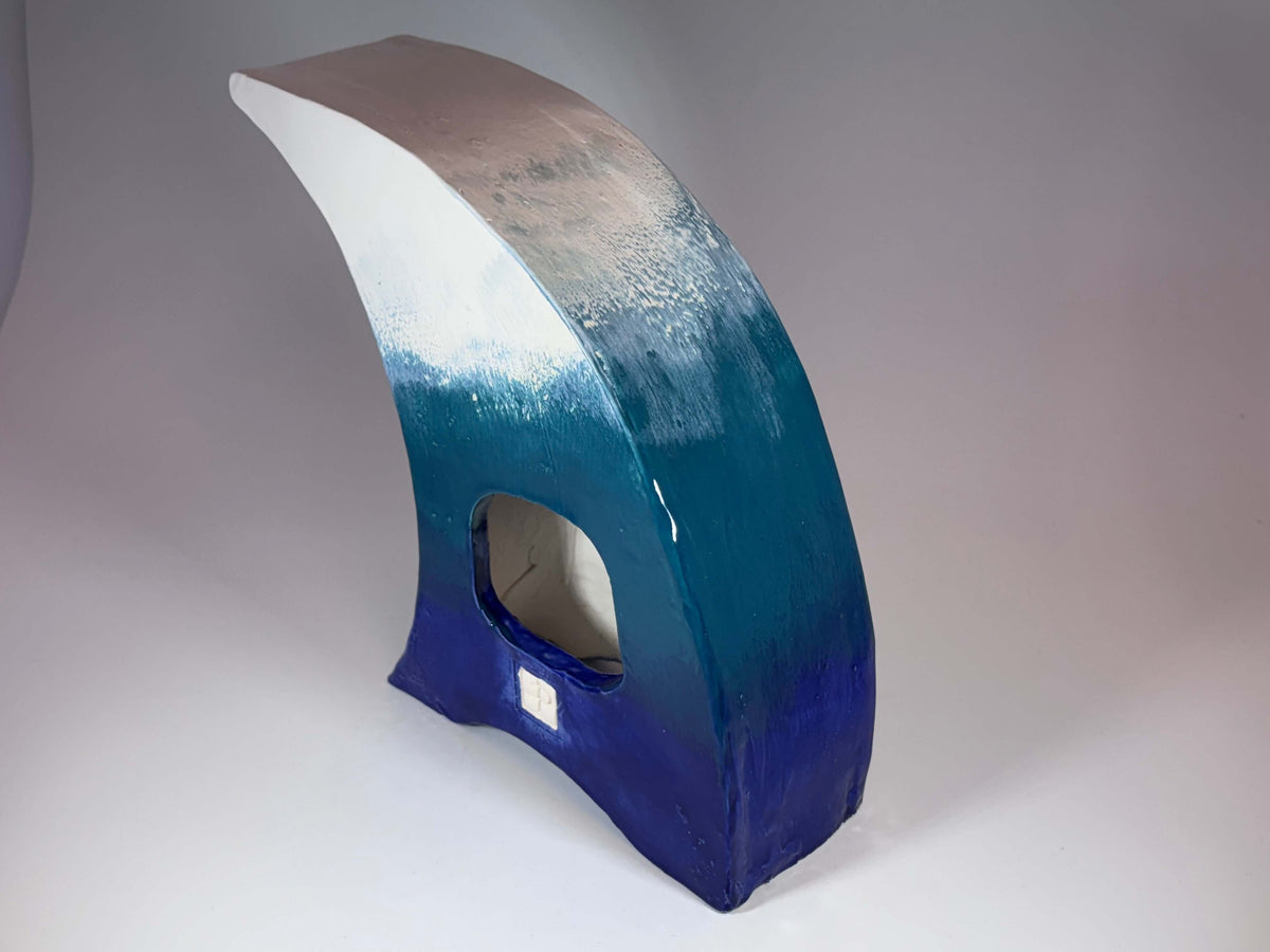 The Wave Ceramic Mantel Clock with Enclosed Face