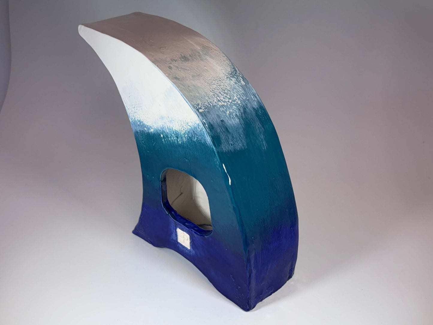 The Wave Ceramic Mantel Clock with Enclosed Face