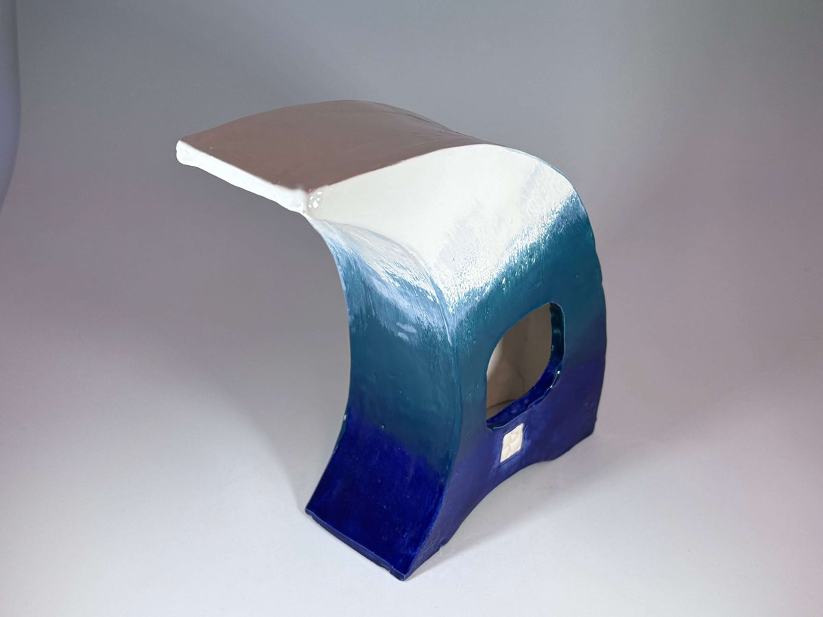 The Wave Ceramic Mantel Clock with Enclosed Face