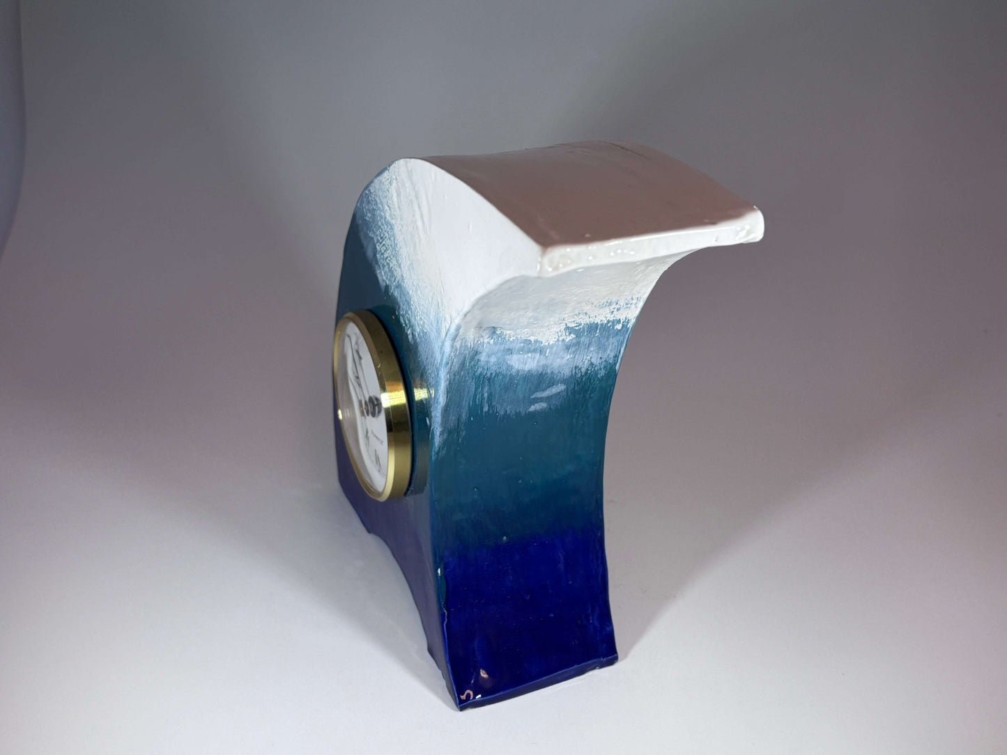 The Wave Ceramic Mantel Clock with Enclosed Face