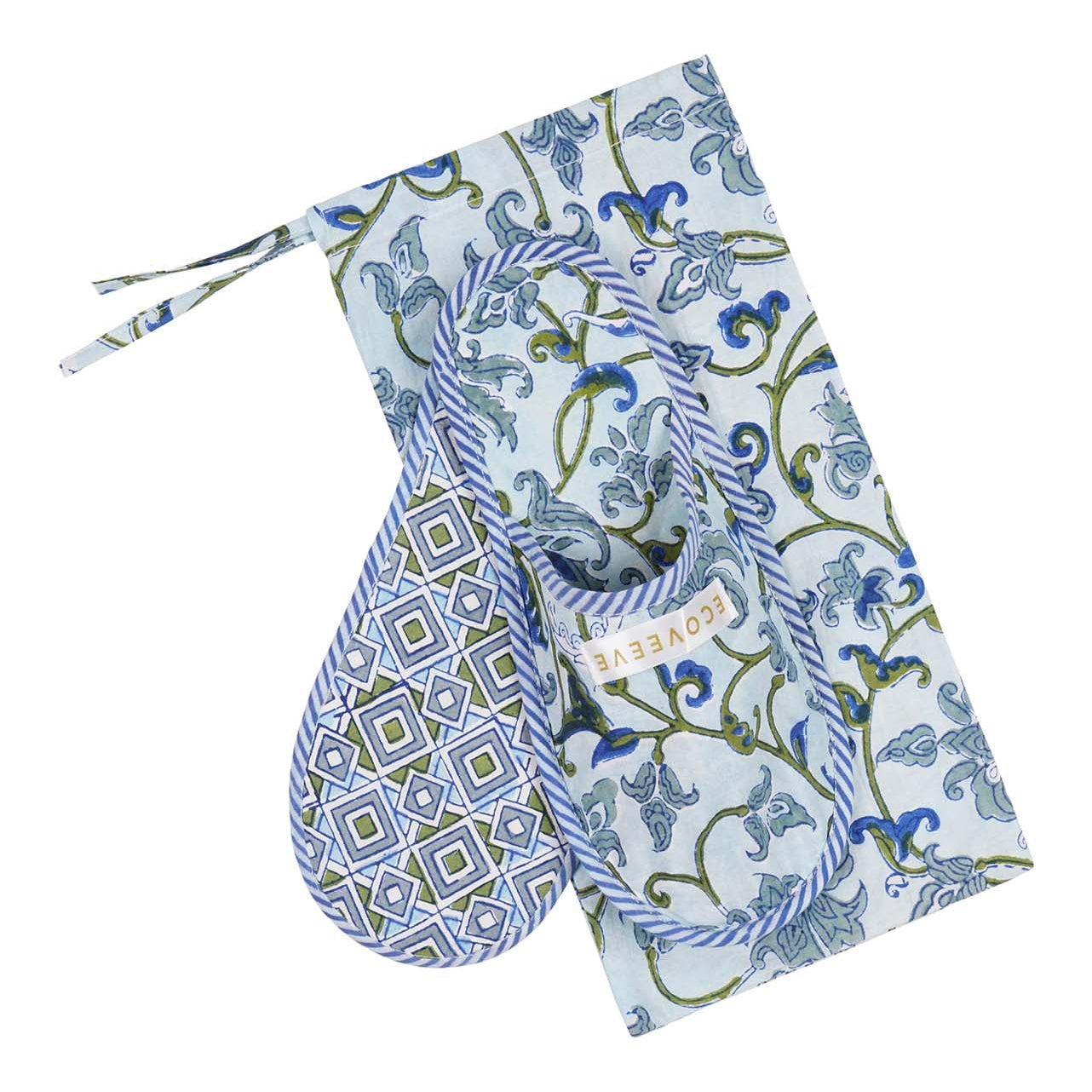 A pair of hand block-printed cotton slippers with floral patterns in blue and white colors.