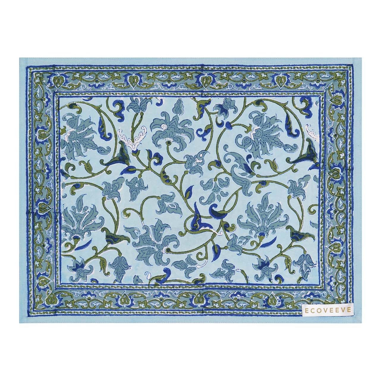A rectangular cotton table mat with a floral hand-block print in blue, green, and white colors.