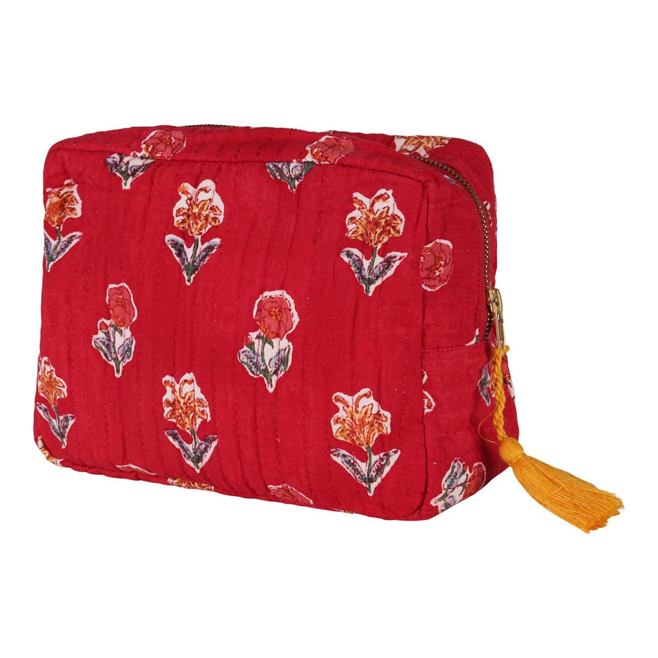 A red hand block-printed vanity pouch with floral patterns, crafted from cotton, with a yellow tassel on the zip.