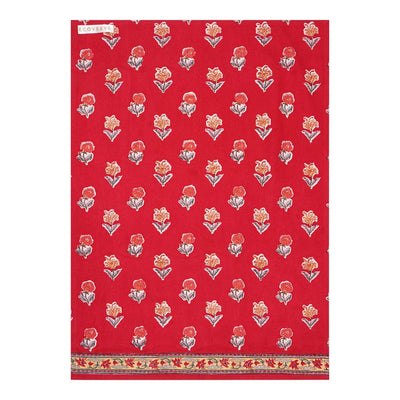 A red hand-block printed cotton tea towel with floral patterns and a border.