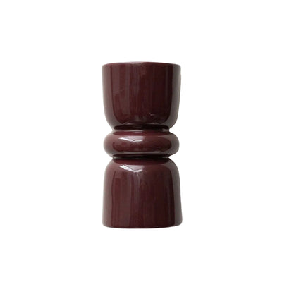 Late Afternoon Lighting Burgundy Up and Down lighter Ceramic Wall Light hung on a white wall