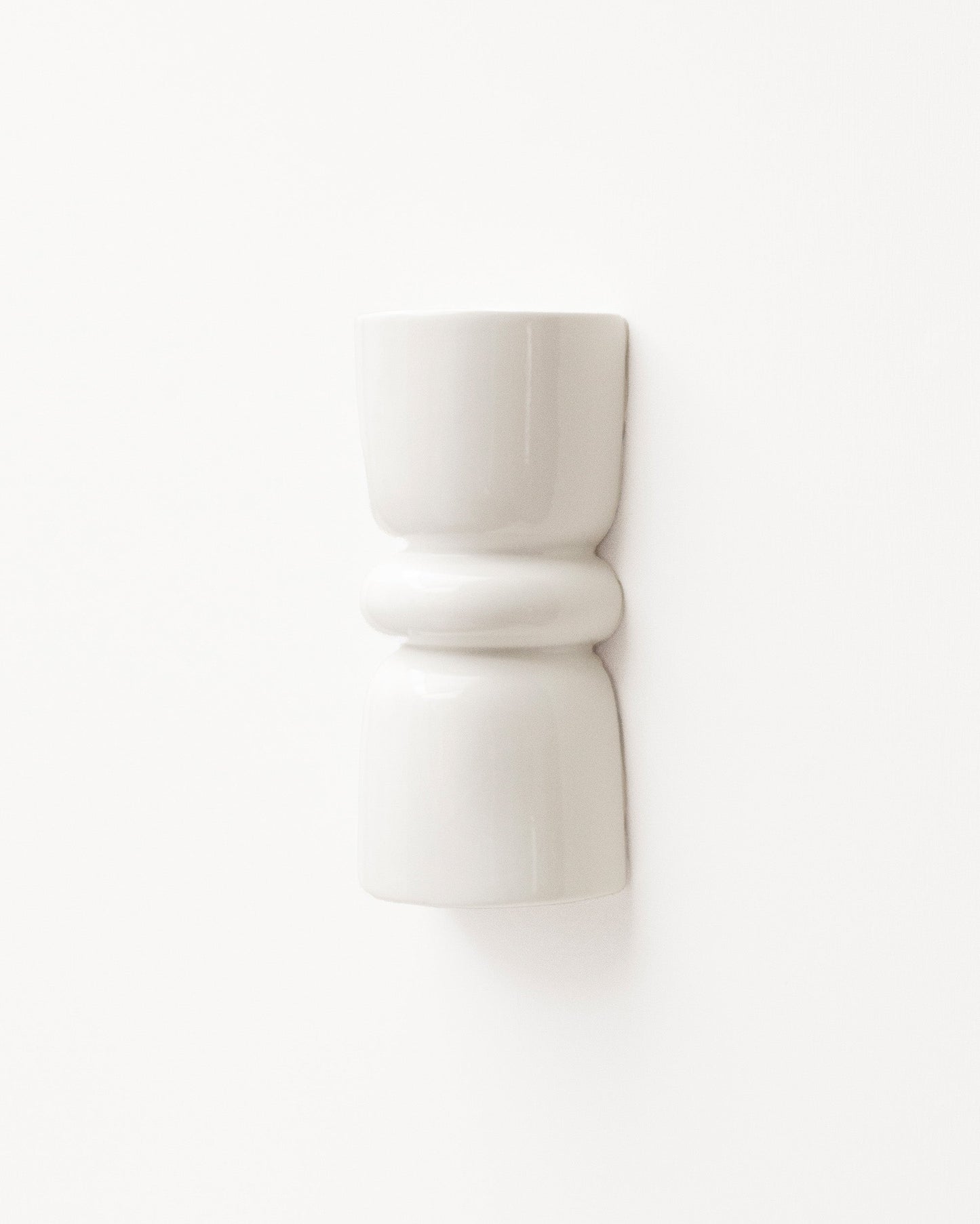 Late Afternoon Lighting White Up and Down lighter Ceramic Wall Light on a white wall