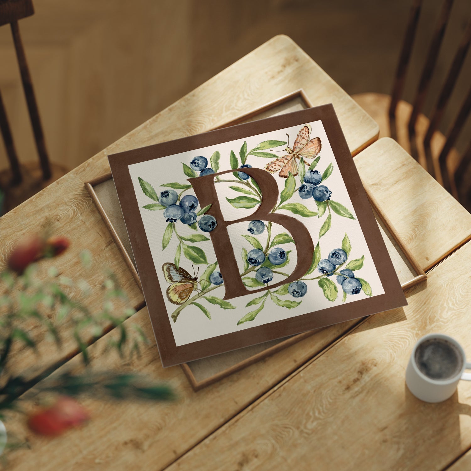 Letter B botanical alphabet art print featuring hand-painted blueberry and butterflies  in chocolate brown and soft pink. 