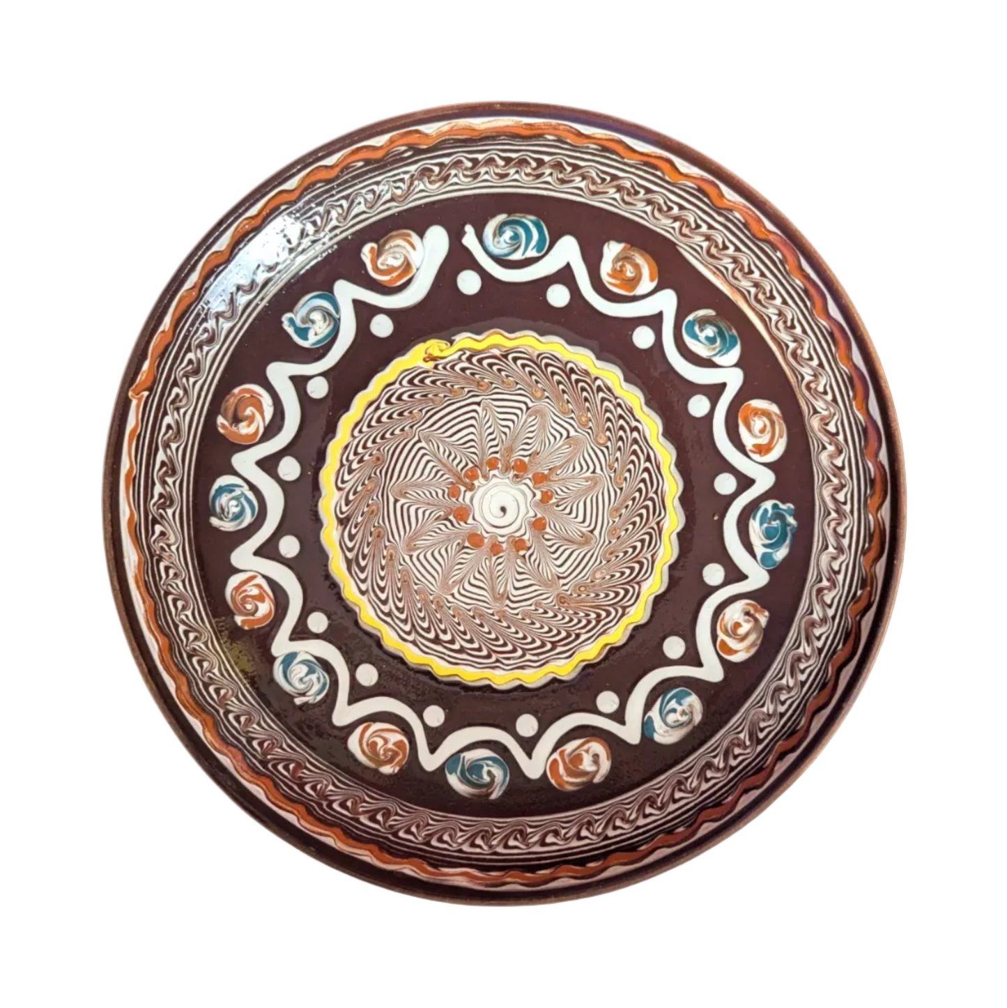 Decorative plate with intricate patterns on a white background