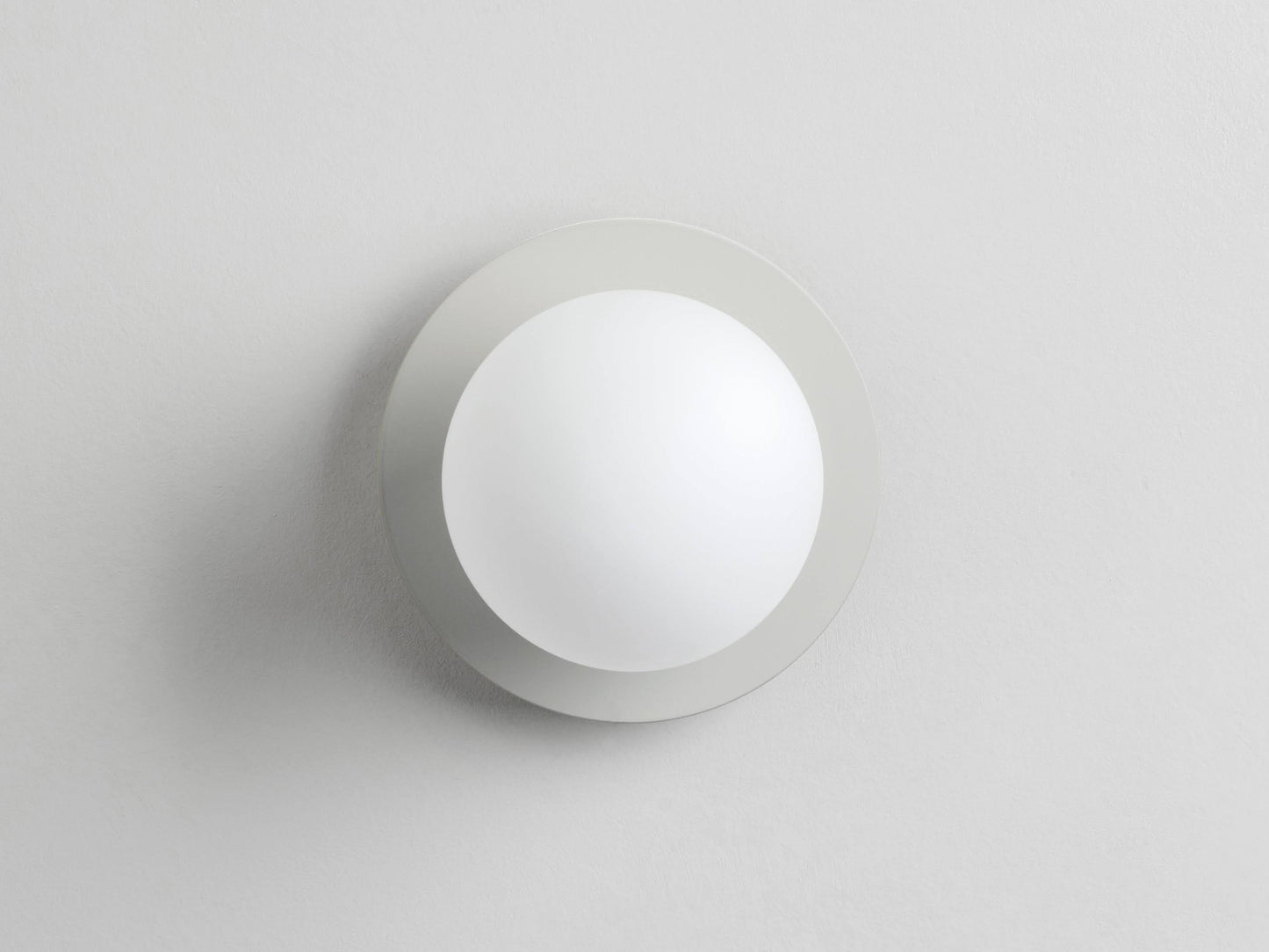 Sand opal disc wall light