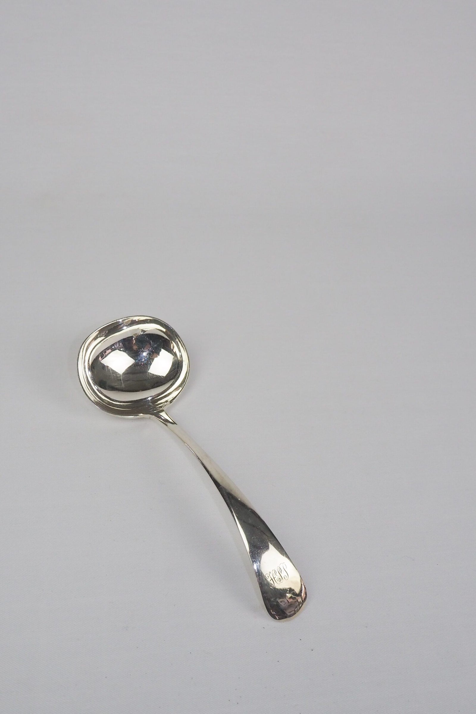 This Vintage Silver Plate Ladle is a stunning piece of service ware. Monogrammed HIP. Wildmore