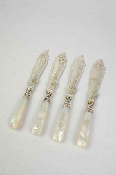 A Set of 4 Antique Silver Plate Fish Knives with mother of pearl handles. The blade of each Victorian Fish Knife has a beautifully etched floral pattern. Wildmore