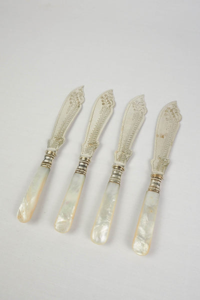 A Set of 4 Antique Silver Plate Fish Knives with mother of pearl handles. The blade of each Victorian Fish Knife has a beautifully etched floral pattern. Wildmore