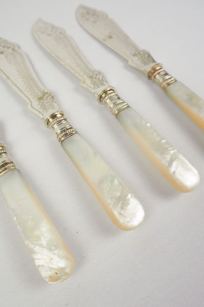 A Set of 4 Antique Silver Plate Fish Knives with mother of pearl handles. The blade of each Victorian Fish Knife has a beautifully etched floral pattern. Wildmore