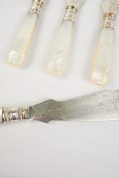 A Set of 4 Antique Silver Plate Fish Knives with mother of pearl handles. The blade of each Victorian Fish Knife has a beautifully etched floral pattern. Wildmore