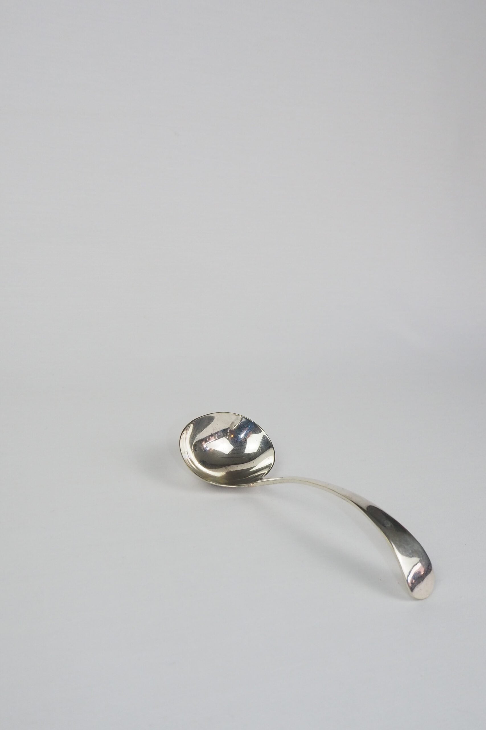 This Vintage Silver Plate Ladle is a stunning piece of service ware. It's characterful patina is perfect for an elegant tablescape and for dishing up your favourite soups. Wildmore