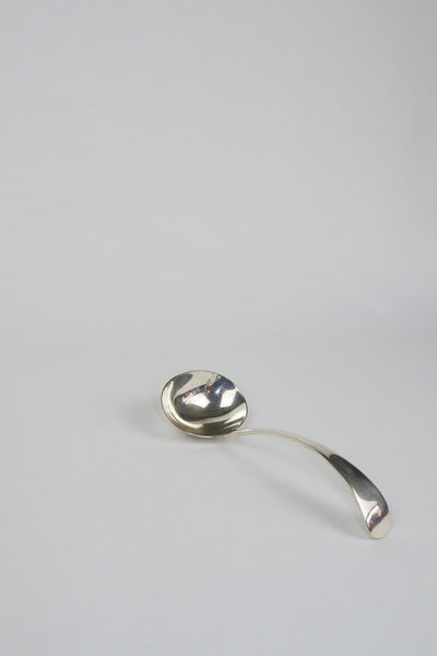 This Vintage Silver Plate Ladle is a stunning piece of service ware. It's characterful patina is perfect for an elegant tablescape and for dishing up your favourite soups. Wildmore