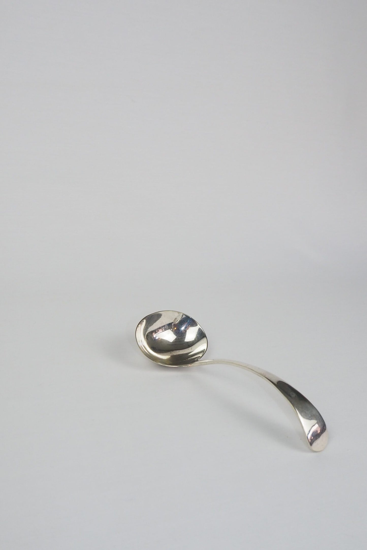 This Vintage Silver Plate Ladle is a stunning piece of service ware. It's characterful patina is perfect for an elegant tablescape and for dishing up your favourite soups. Wildmore
