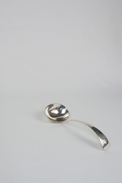This Vintage Silver Plate Ladle is a stunning piece of service ware. It's characterful patina is perfect for an elegant tablescape and for dishing up your favourite soups. Wildmore