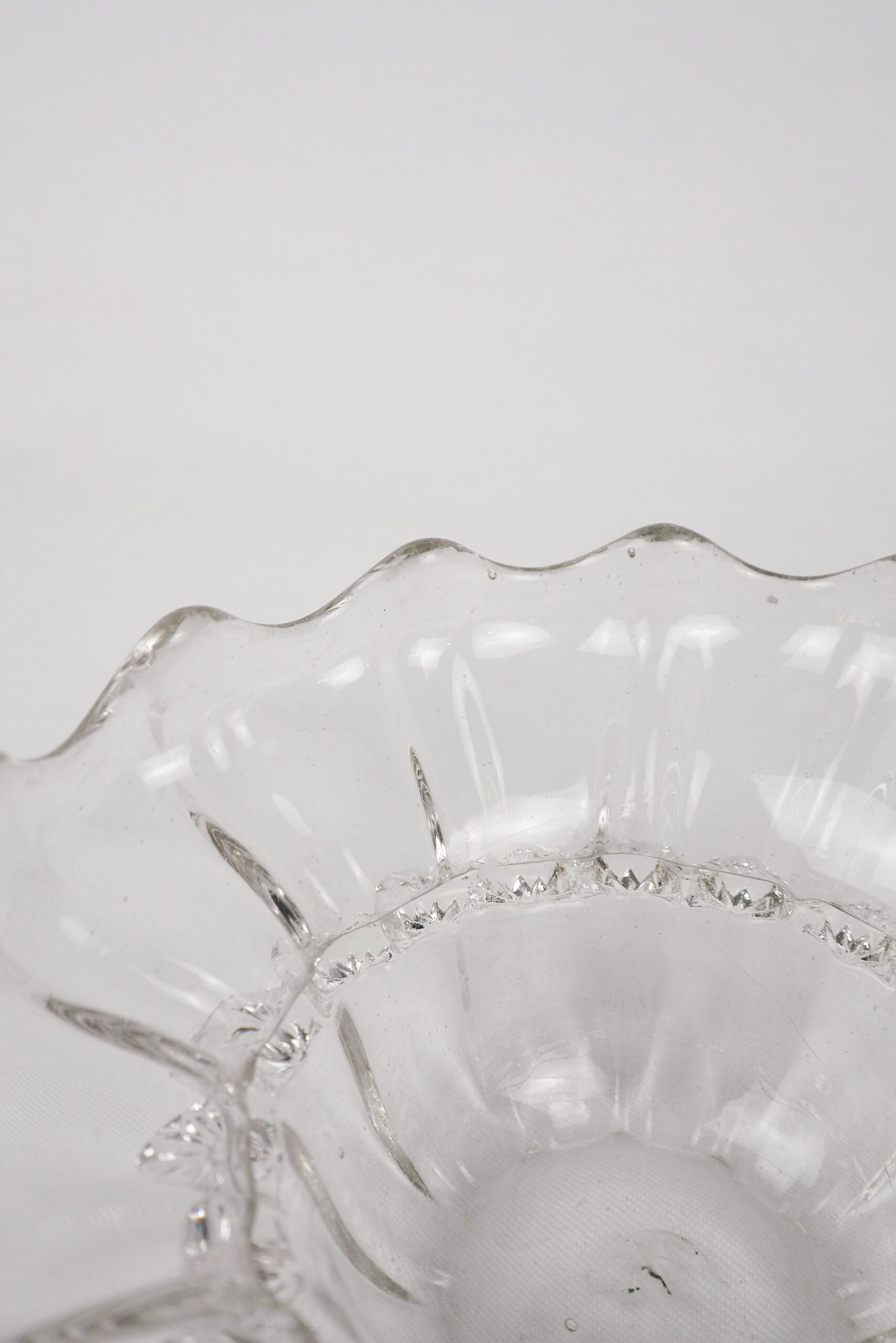 A stunning Vintage Hand Blown Glass Dish with delicate bubbles running through the glass giving it a gorgeous viscous look. Hand blown Mid-Century glass dish with a petal pattern around the centre. Wildmore