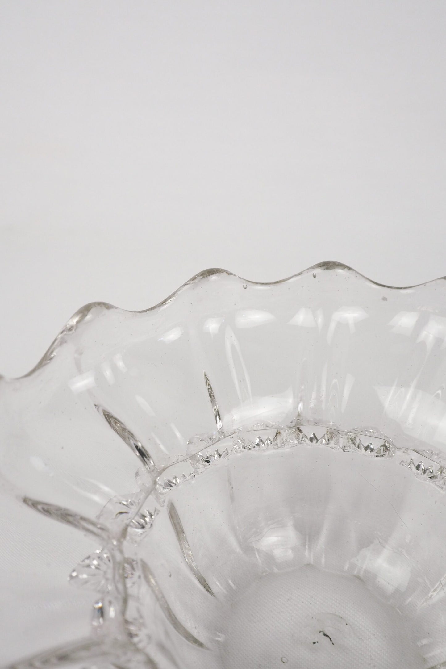 A stunning Vintage Hand Blown Glass Dish with delicate bubbles running through the glass giving it a gorgeous viscous look. Hand blown Mid-Century glass dish with a petal pattern around the centre. Wildmore