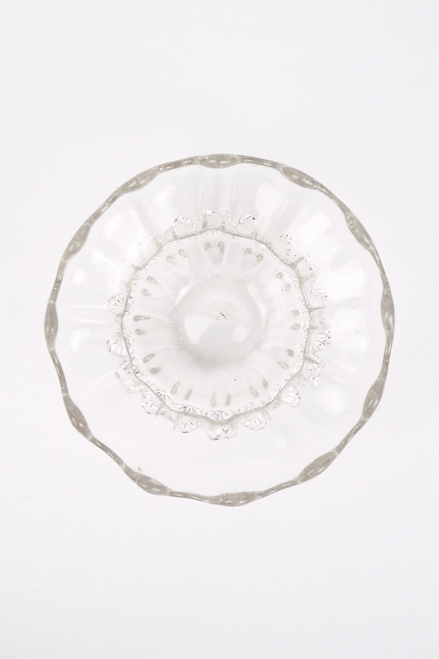 A stunning Vintage Hand Blown Glass Dish with delicate bubbles running through the glass giving it a gorgeous viscous look. Hand blown Mid-Century glass dish with a petal pattern around the centre. Wildmore
