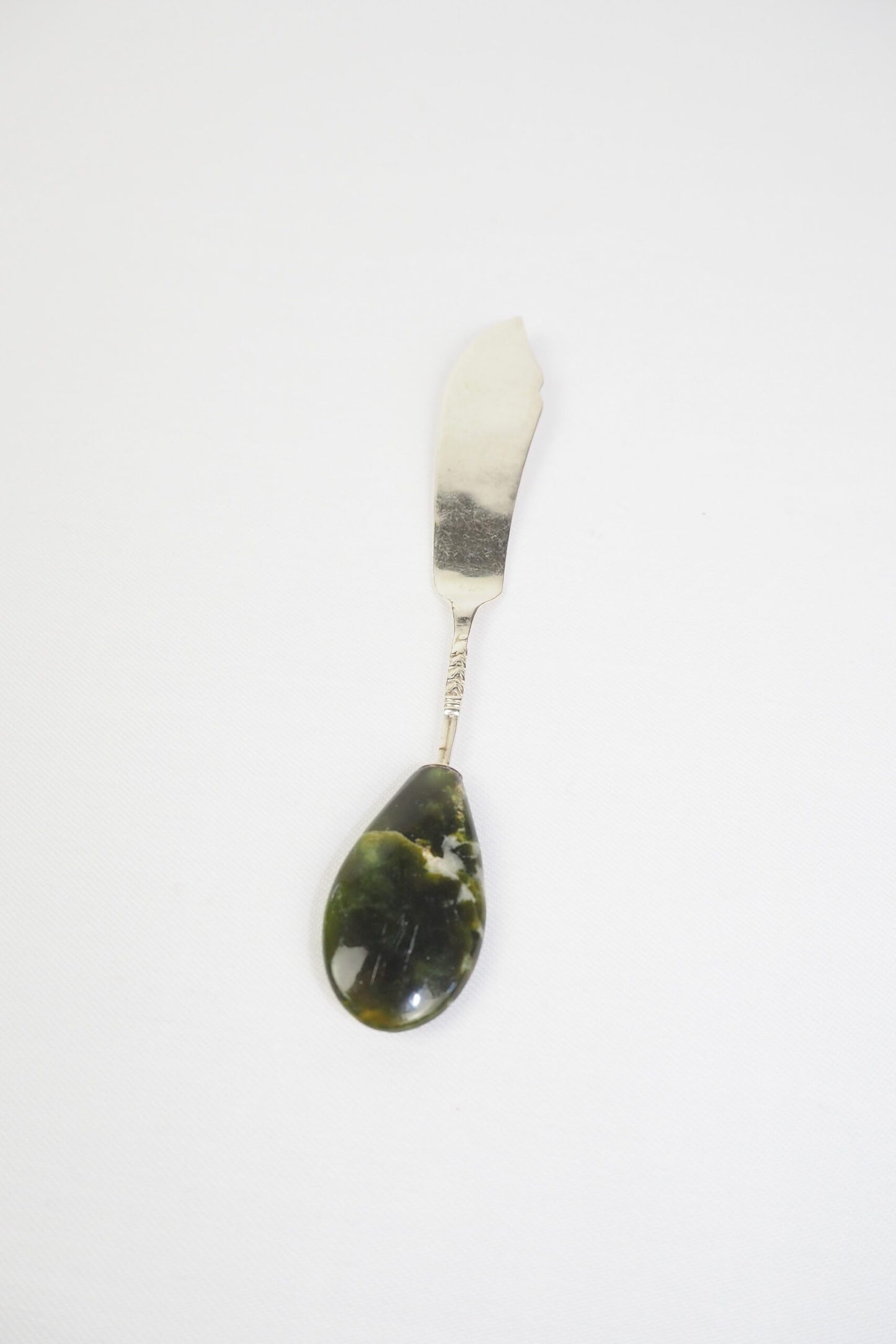 This Vintage Agate Butter Knife has a silver plated blade and a beautiful moss agate handle.
