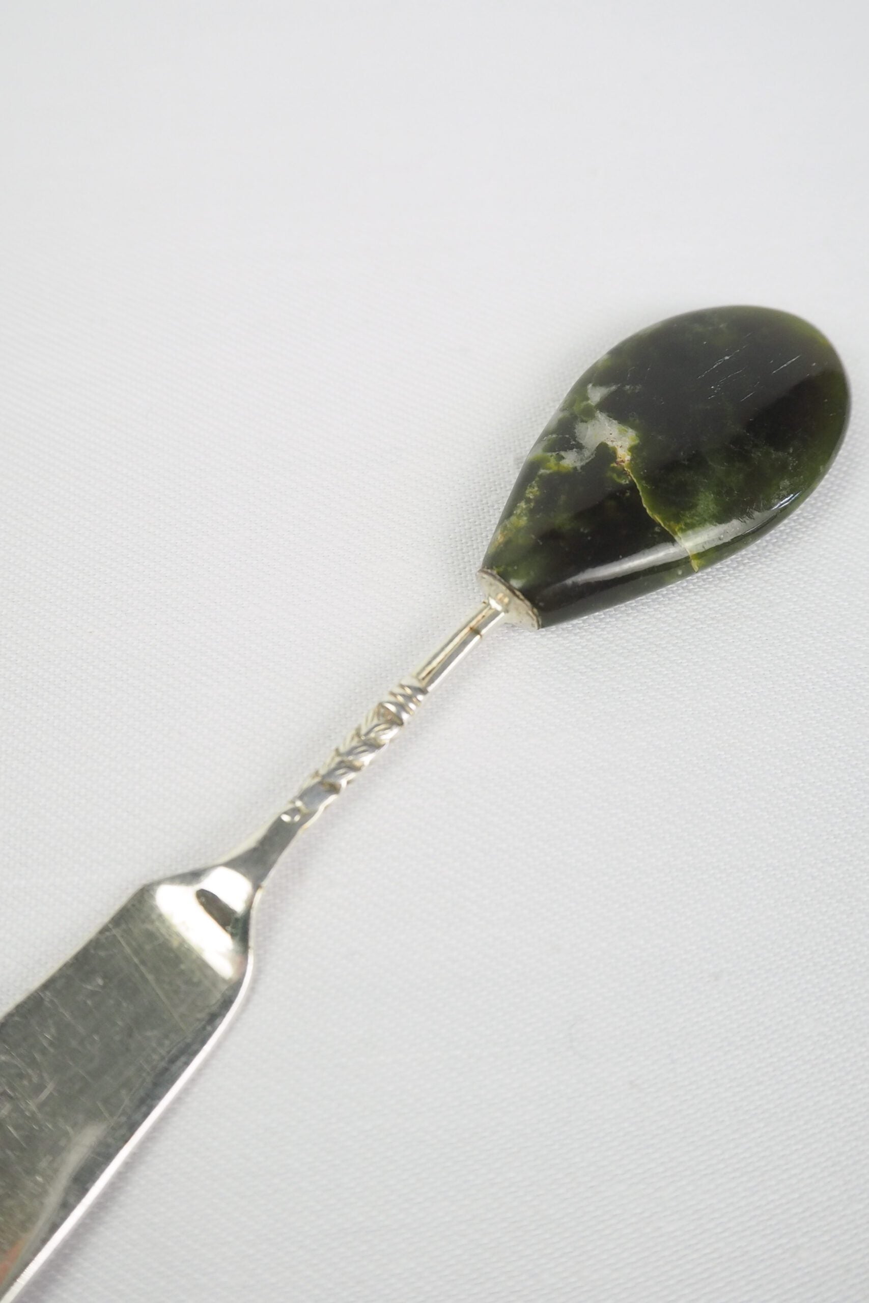 This Vintage Agate Butter Knife has a silver plated blade and a beautiful moss agate handle.