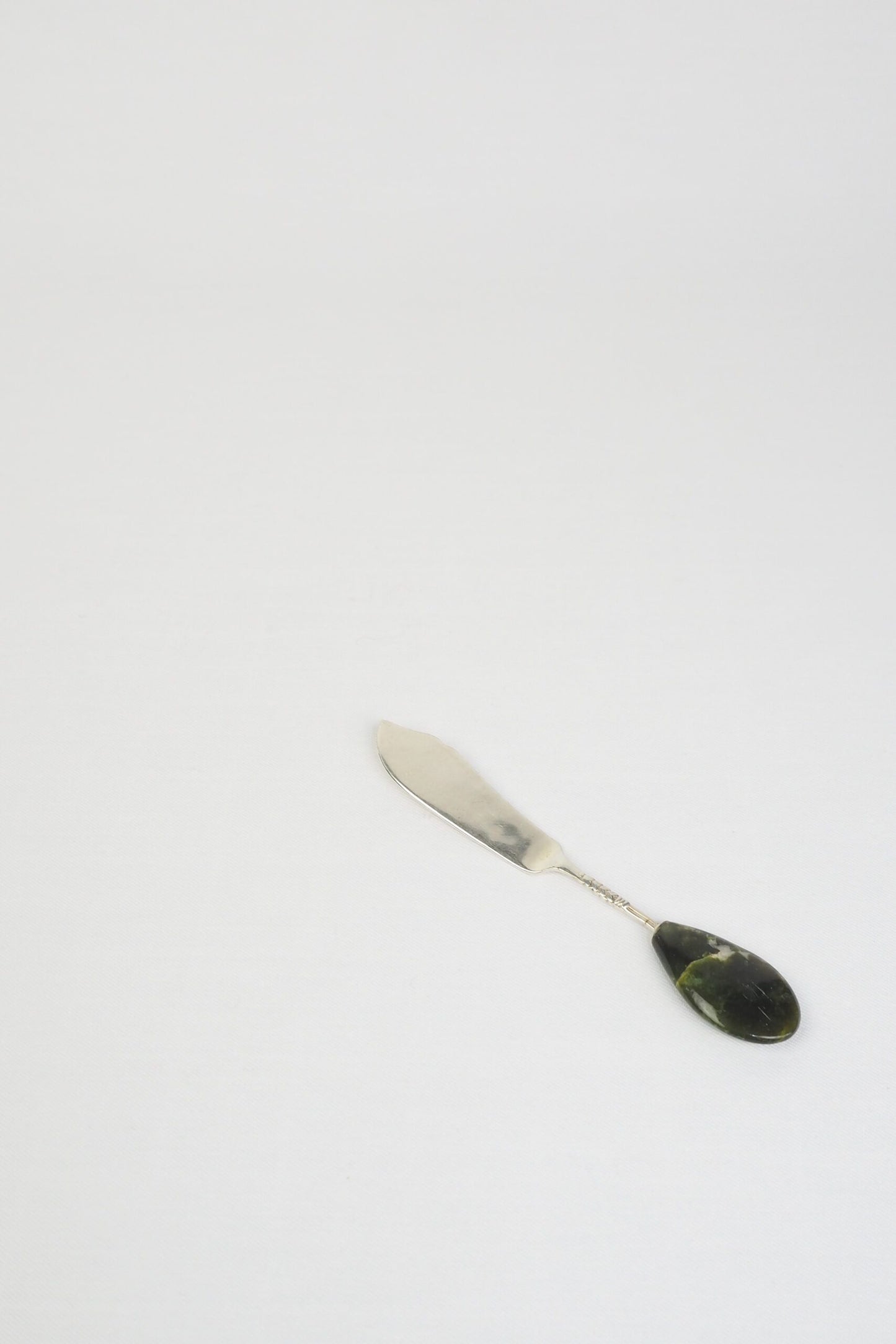 This Vintage Agate Butter Knife has a silver plated blade and a beautiful moss agate handle.