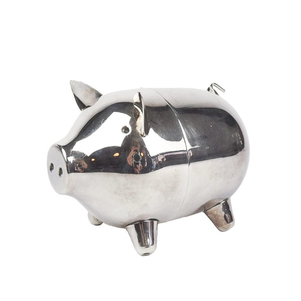 A wonderful Vintage Silver Plate Piggy Bank. This silver plated pig money box has a little curly tail and expressive ears. Wildmore