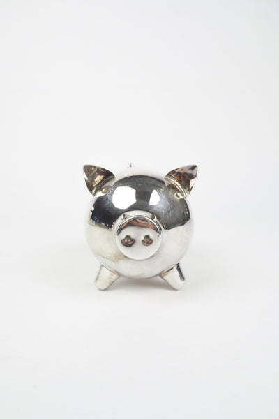 A wonderful Vintage Silver Plate Piggy Bank. This silver plated pig money box has a little curly tail and expressive ears. Wildmore