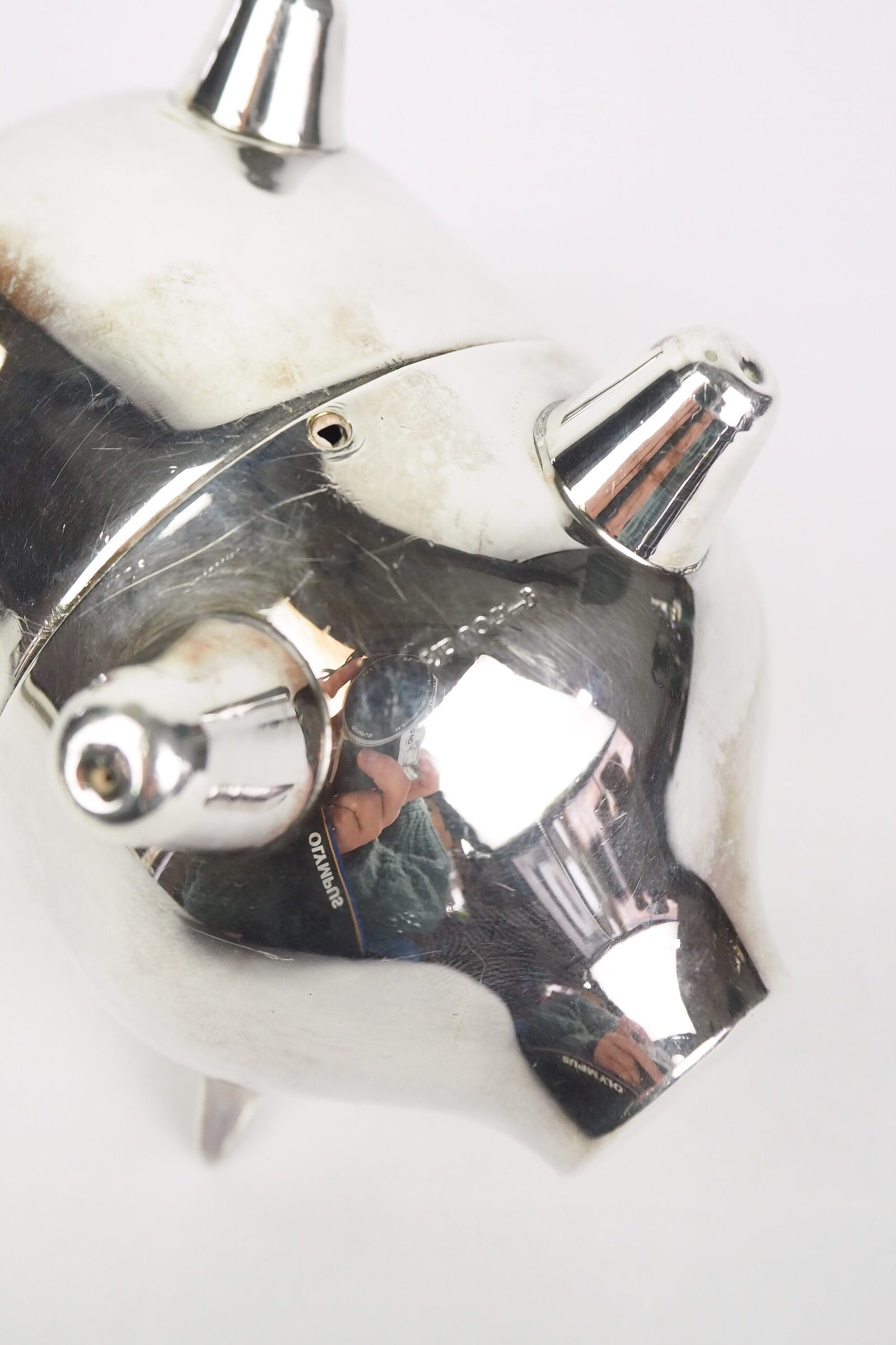 A wonderful Vintage Silver Plate Piggy Bank. This silver plated pig money box has a little curly tail and expressive ears. Wildmore