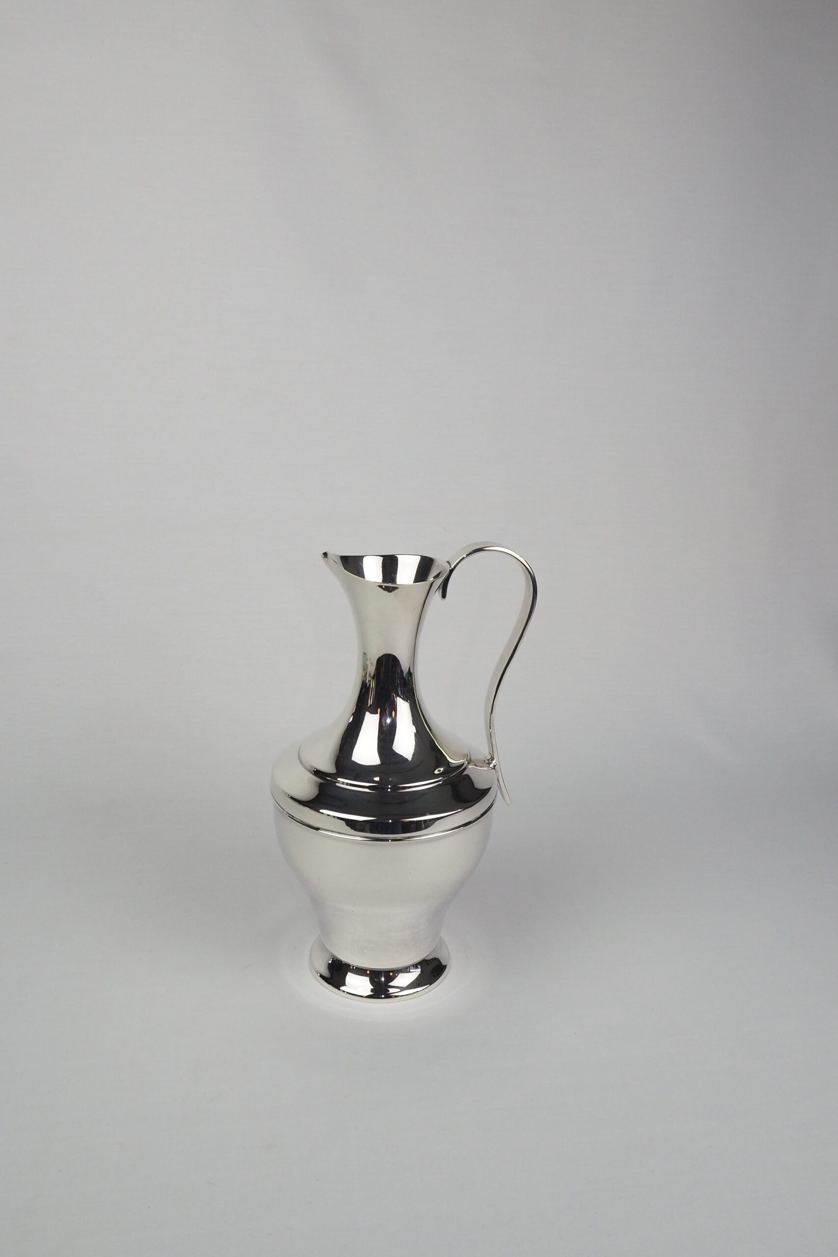 A Vintage Silver Plate Pitcher, perfect for your dining table. Wildmore