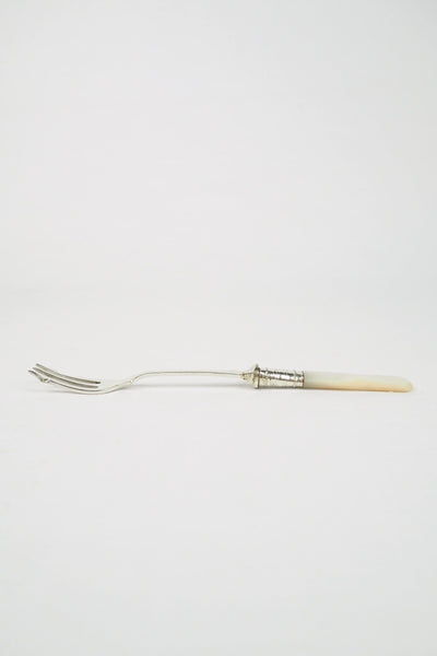 This Antique Pickle Fork has a beautiful Mother of Pearl handle, a Silver Plated neck and barbed prongs. Wildmore