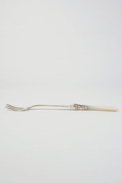 This Antique Pickle Fork has a beautiful Mother of Pearl handle, a Silver Plated neck and barbed prongs. Wildmore