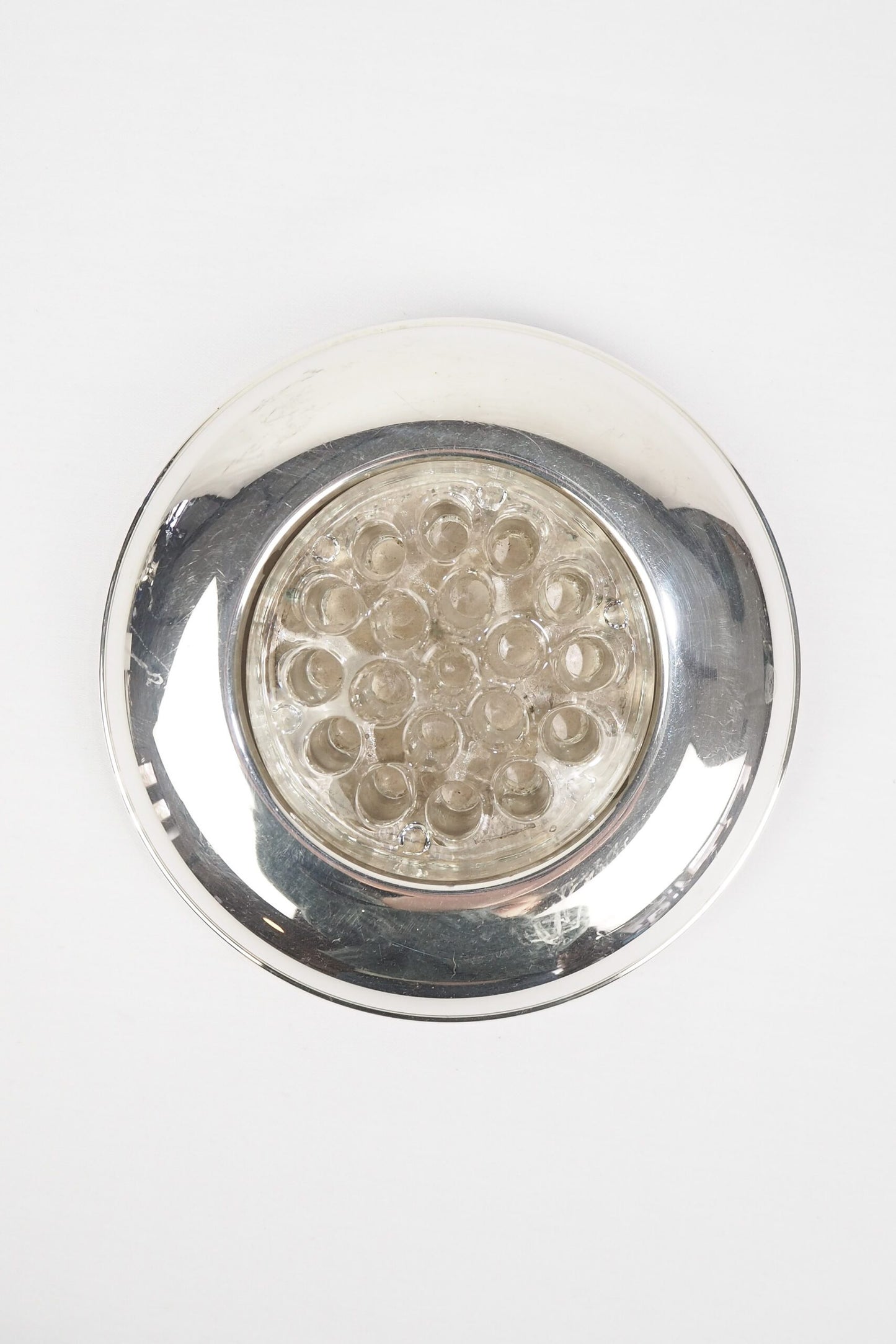 A vintage Silver Plate Flower Bowl with original glass flower frog. Filled with water, this mid century flower dish and flower frog is an elegant way to display your long stem flowers. Wildmore
