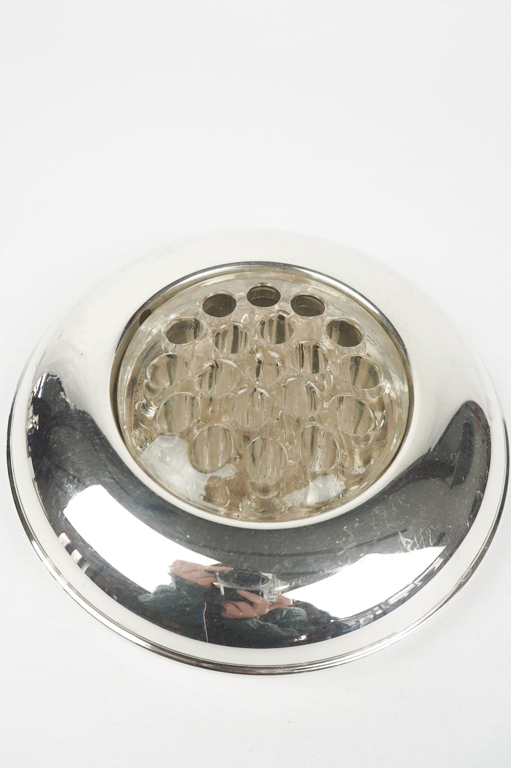 A vintage Silver Plate Flower Bowl with original glass flower frog. Filled with water, this mid century flower dish and flower frog is an elegant way to display your long stem flowers. Wildmore