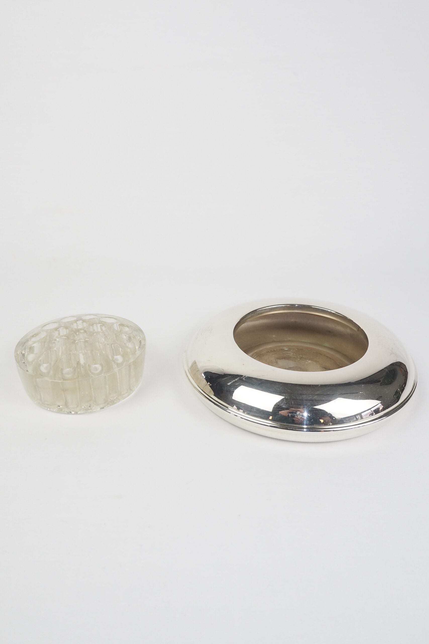 A vintage Silver Plate Flower Bowl with original glass flower frog. Filled with water, this mid century flower dish and flower frog is an elegant way to display your long stem flowers. Wildmore
