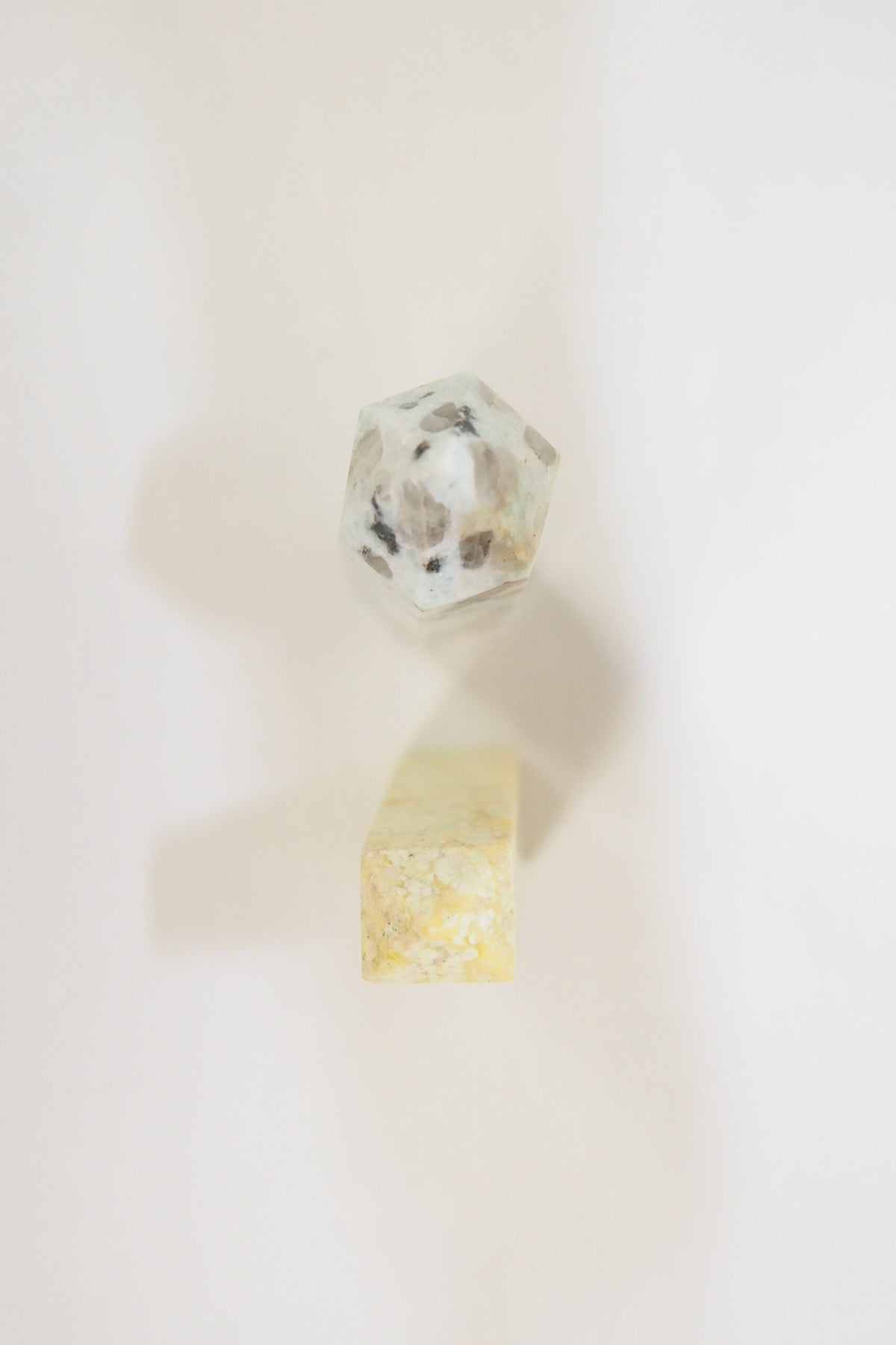 A decorative Pair of Mineral Obelisks including a Kiwi Jasper and a Serpentine Tower.