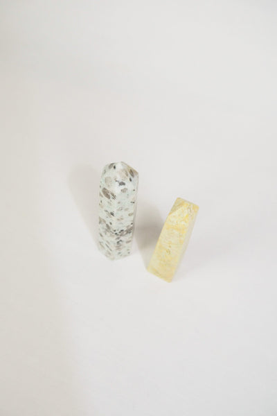 A decorative Pair of Mineral Obelisks including a Kiwi Jasper and a Serpentine Tower.