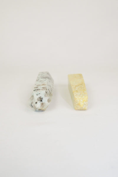 A decorative Pair of Mineral Obelisks including a Kiwi Jasper and a Serpentine Tower.