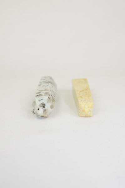 A decorative Pair of Mineral Obelisks including a Kiwi Jasper and a Serpentine Tower.