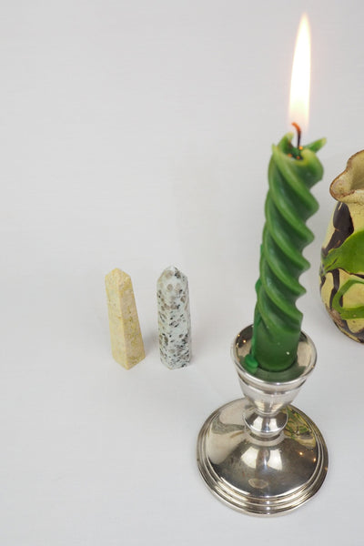 A decorative Pair of Mineral Obelisks including a Kiwi Jasper and a Serpentine Tower.