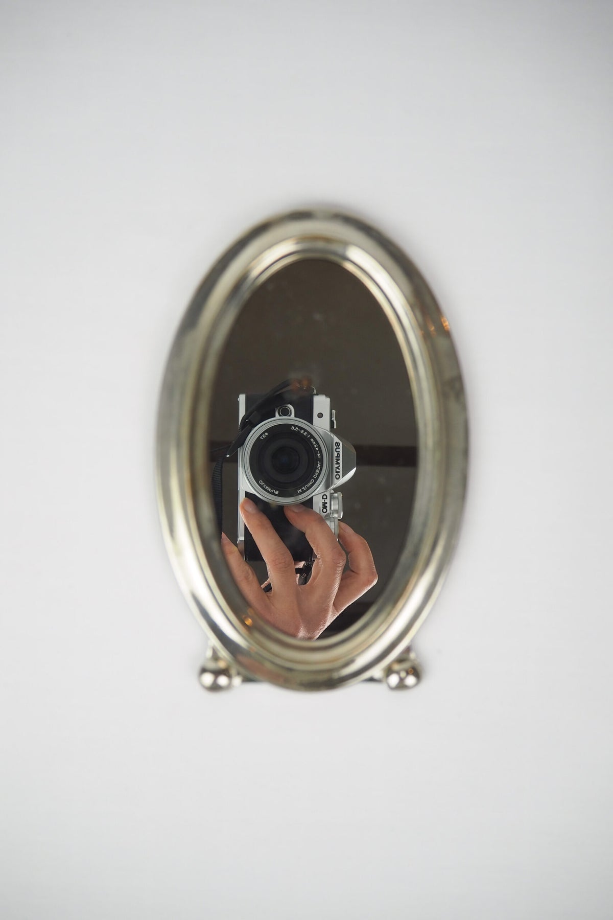 An Antique Silver Plate Framed Mirror. This antique silver plate mirror is perfect for your mantelpiece.