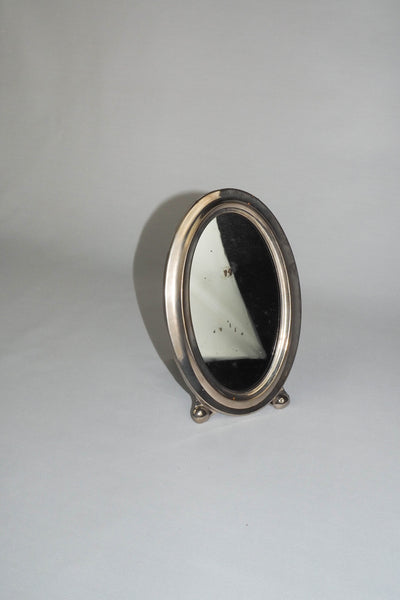 An Antique Silver Plate Framed Mirror. This antique silver plate mirror is perfect for your mantelpiece.