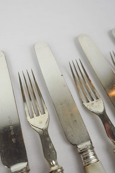 10 piece Antique Mother of Pearl Cutlery Set. The aged silver plate and mother of pearl handles give this set of knives and forks an antique look
