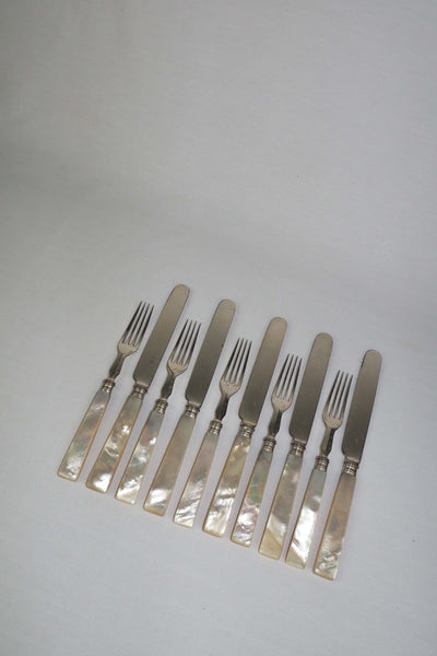 10 piece Antique Mother of Pearl Cutlery Set. The aged silver plate and mother of pearl handles give this set of knives and forks an antique look