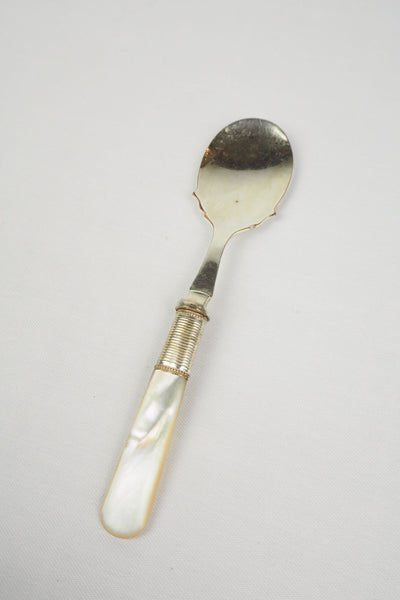 An Antique Jam Spoon With a Mother of Pearl handle and a Silver Plated neck and shallow bowl. An incredibly useful and beautiful piece of cutlery.
