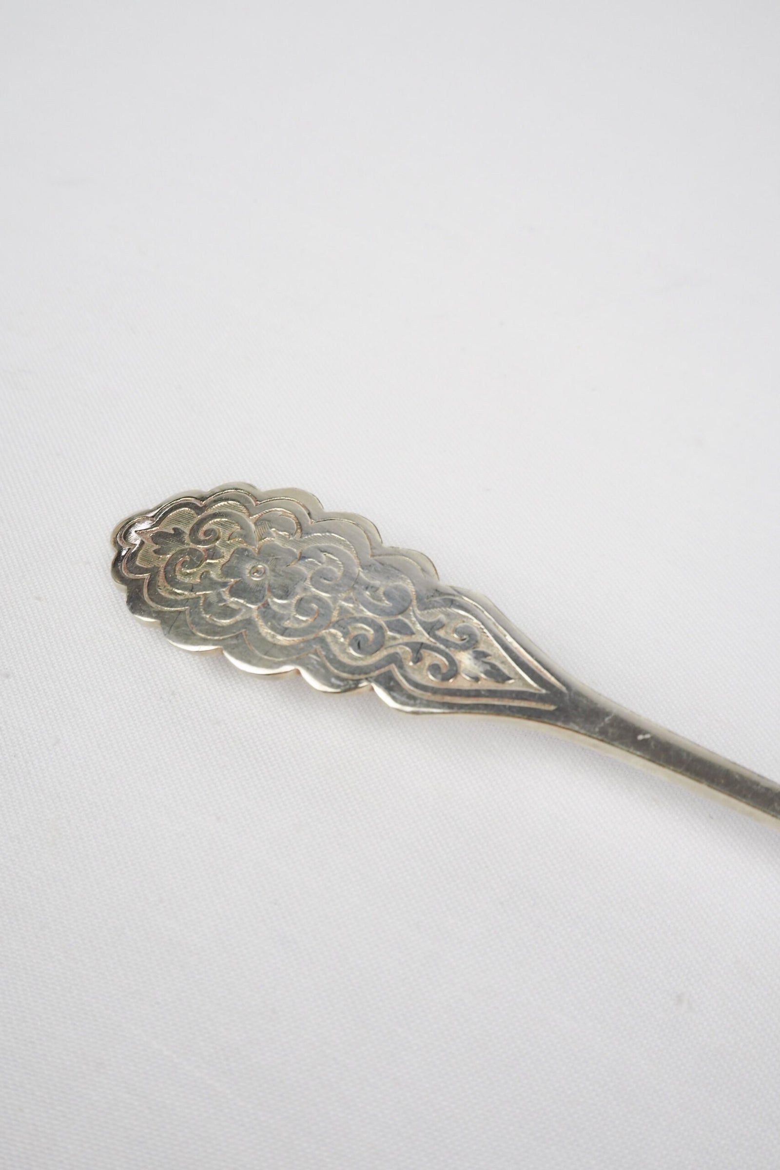An Antique Fruit Salad Spoon With a stunning pressed pattern through the Silver Plated neck and bowl.