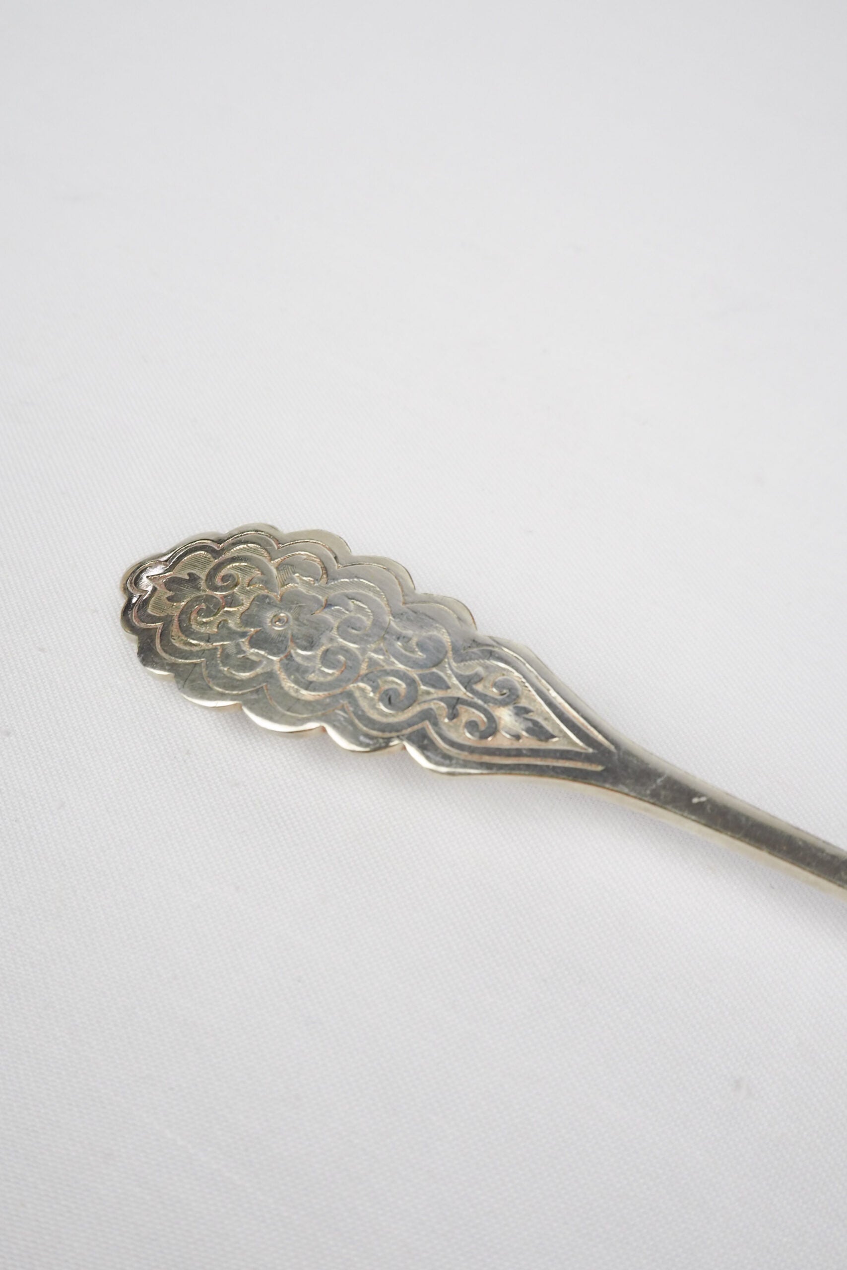 An Antique Fruit Salad Spoon With a stunning pressed pattern through the Silver Plated neck and bowl.