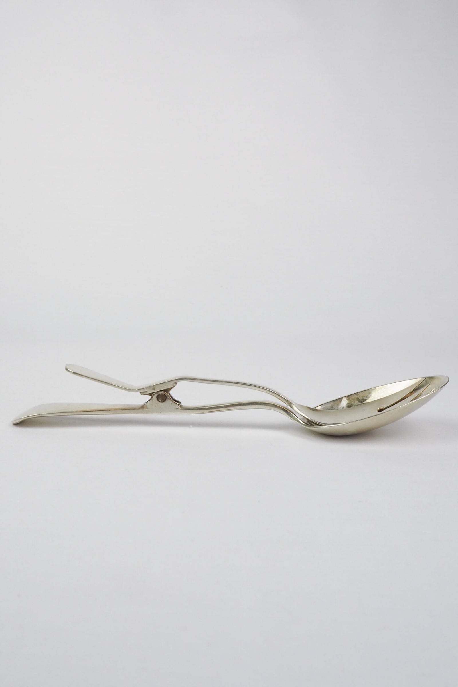 Silver Plate Hinged Salad Servers have a wonderful stone washed patina to the silver.